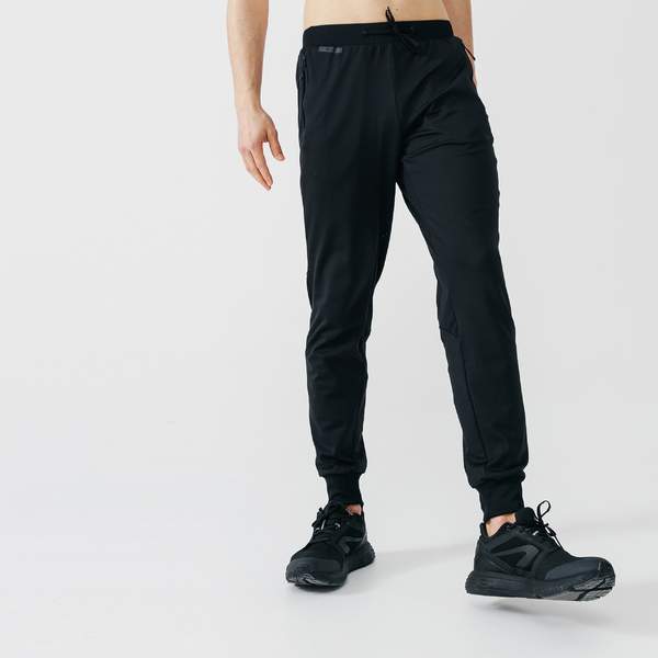 Брюки для бега свободного кроя мужские черные RUN WARM+ Kalenji