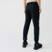 Брюки для бега свободного кроя мужские черные RUN WARM+ Kalenji