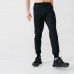 Брюки для бега свободного кроя мужские черные RUN WARM+ Kalenji